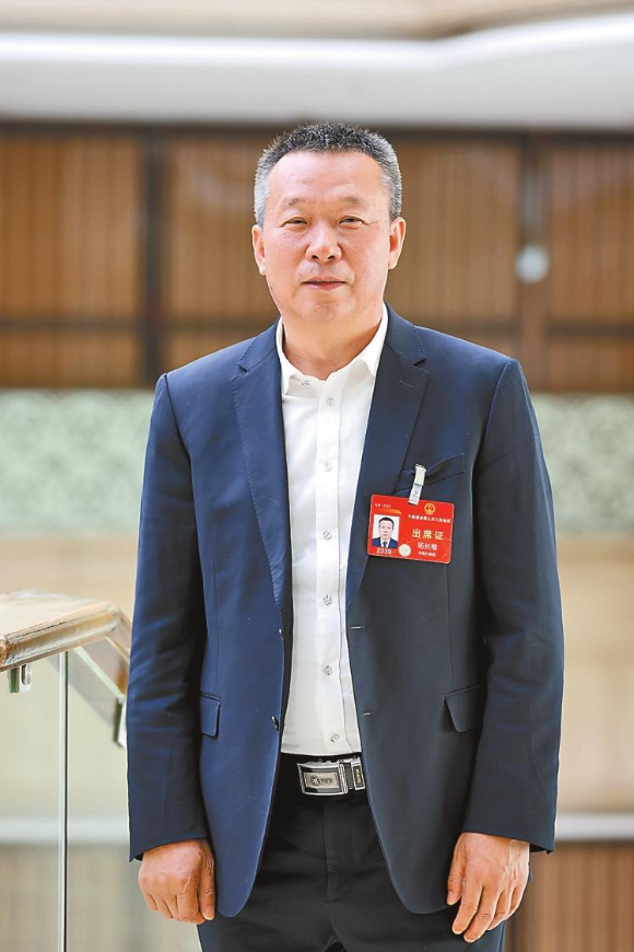 代表访谈全国人大代表杨长楷因地制宜壮大家门口的产业